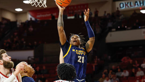 Dec 6, 2022; Norman, Oklahoma, USA; Kansas City Roos guard Rayquawndis Mitchell (21) shoots against the Oklahoma Sooners during the first half at Lloyd Noble Center. Mandatory Credit: Alonzo Adams-USA TODAY Sports  